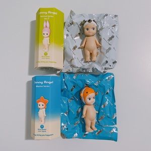 Two Sonny Angel Figures: Marine Series Clownfish and Animal Series 1 Sloth